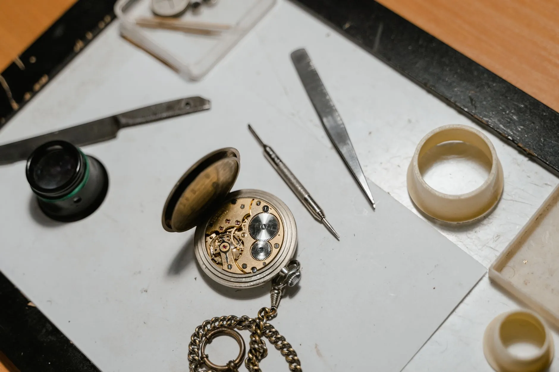 The watchmaker cases it, checks it, and signs the timing sheet that ships in the box.